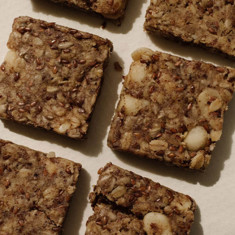 Jolly Mama protein bars discovery pack, square portions with nuts top view